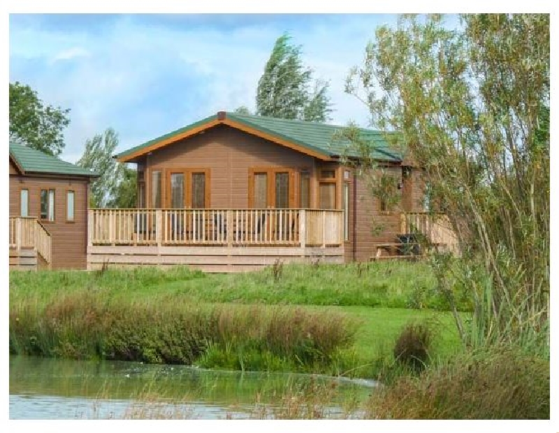 Harvester Lodge a holiday cottage rental for 6 in Hewish, 