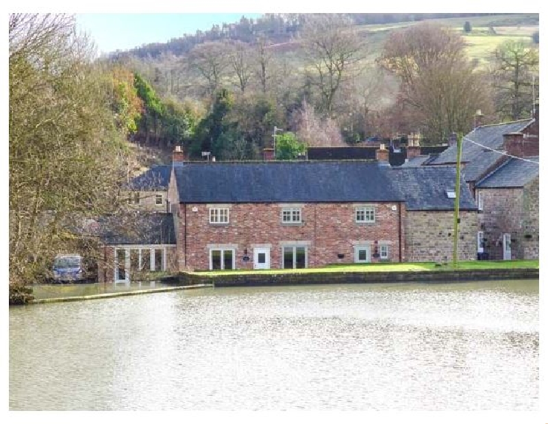 Image of Weir Cottage on the Mill Pond