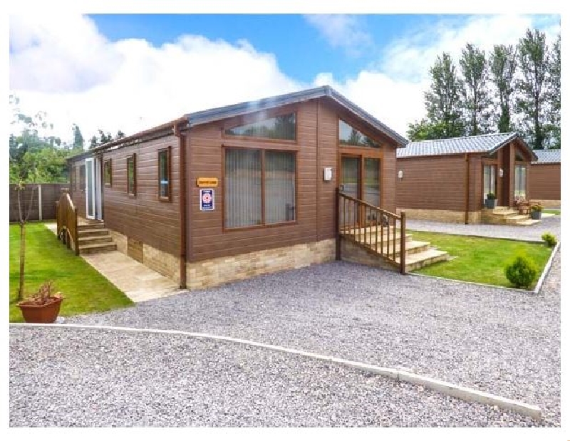 Squirrel Lodge at Woodlands View a holiday cottage rental for 5 in Sling, 