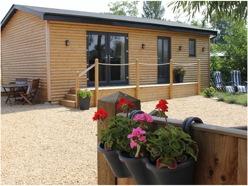 Greenways Log Cabin a holiday cottage rental for 2 in Newent, 