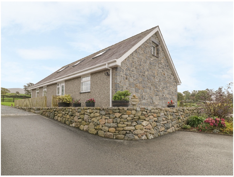 Ty Ni a holiday cottage rental for 7 in Caeathro, 