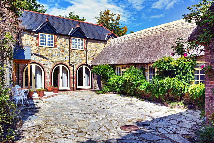 Courtyard Cottages a holiday cottage rental for 15 in Lyme Regis, 
